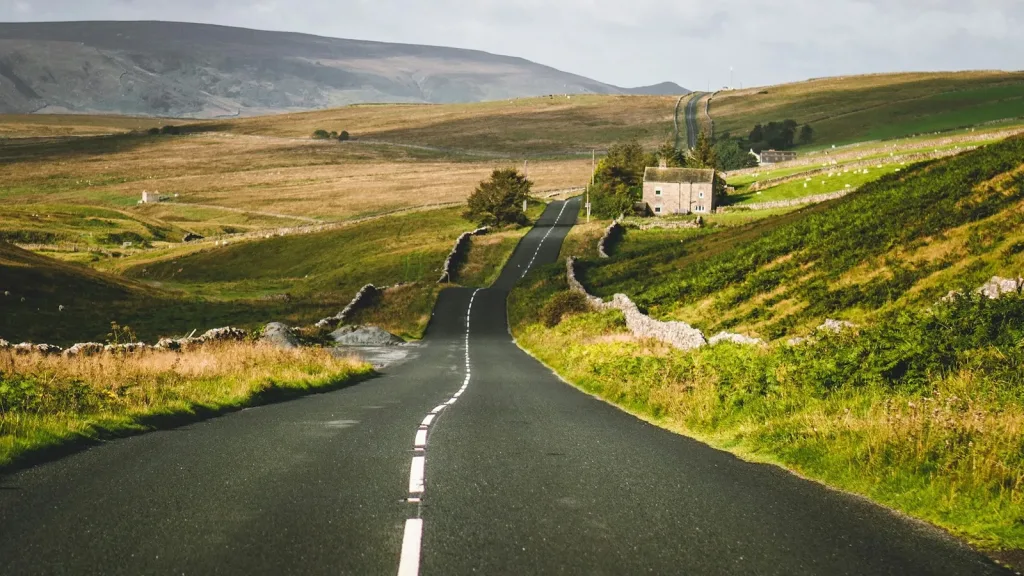 A-tranquil-road-leads-through-the-picturesque-countryside-landscape | WBCSD